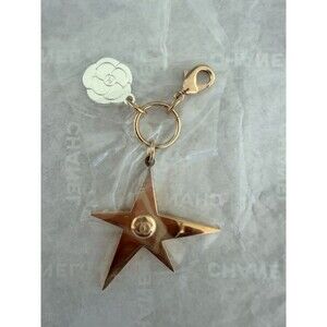 New CHANEL Beauty Holiday 2025 Star Comet Camellia Charm Keychain Gold Silver